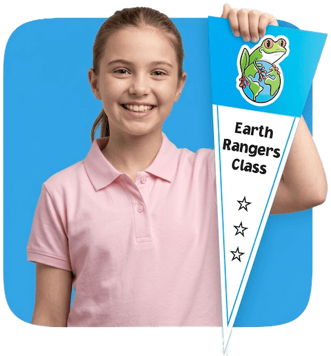 Student holding Earth Rangers Class pennant